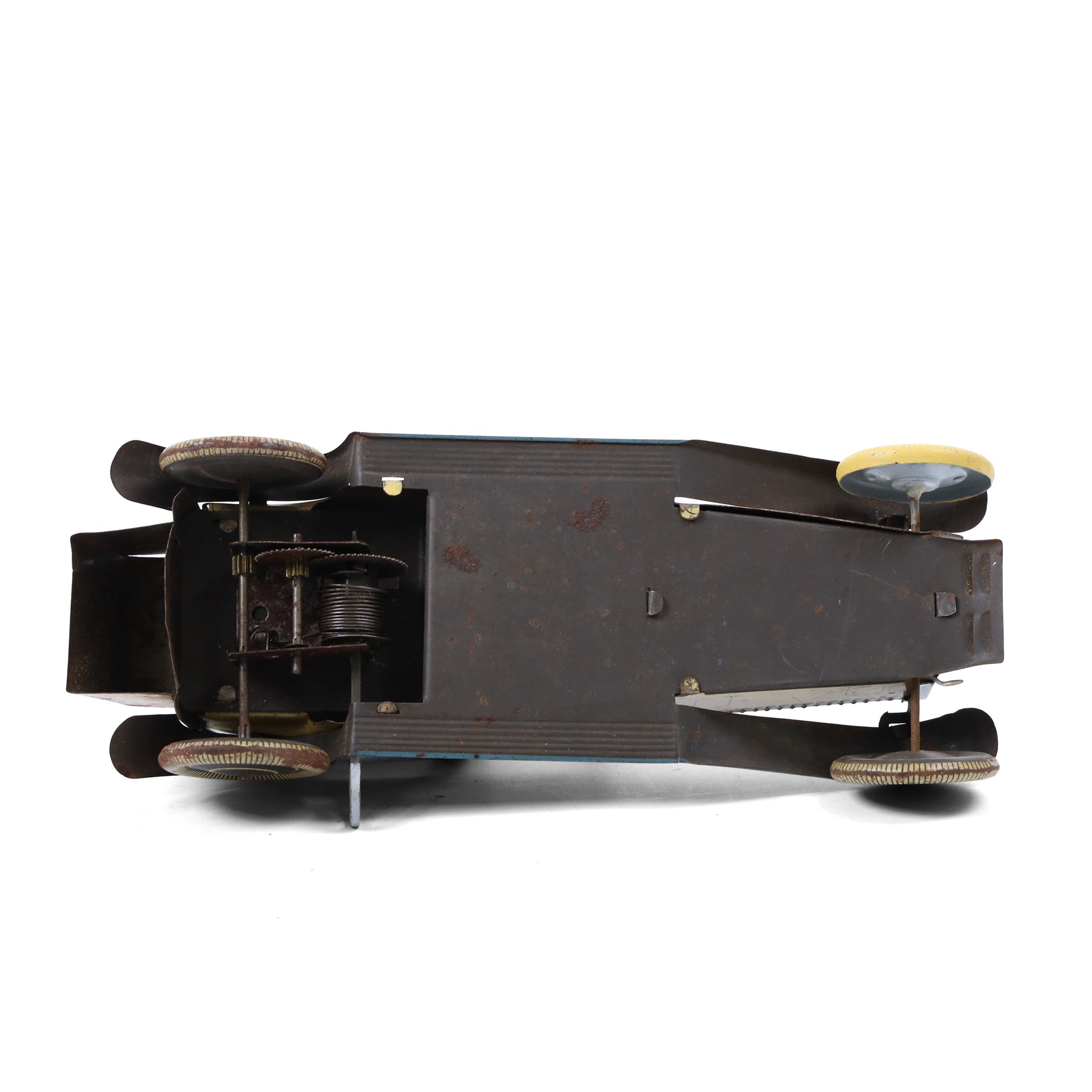 Wells tinplate clockwork limousine, the cream body, with blue roof and lithographed details, with driver and key, H8cm, L23cm