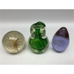 Victorian green glass dump paperweight with internal foil flower decoration, together with other figural and stylised animal paperweights to include Mats Jonasson Maleras seal paperweight, Wedgwood bear, swan examples, Baccarat style examples, captured bubble and cane examples, art glass vases etc