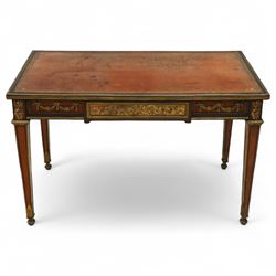 Fine 19th-century Louis XVI-style mahogany and gilt bronze-mounted writing table, rectangular top with a gilt tooled tan leather writing surface within a moulded gilt bronze edge above a frieze fitted with three drawers, mounted with floral and foliate gilt bronze swags  and borders, raised on square tapering legs with acanthus mounts and toupie feet
