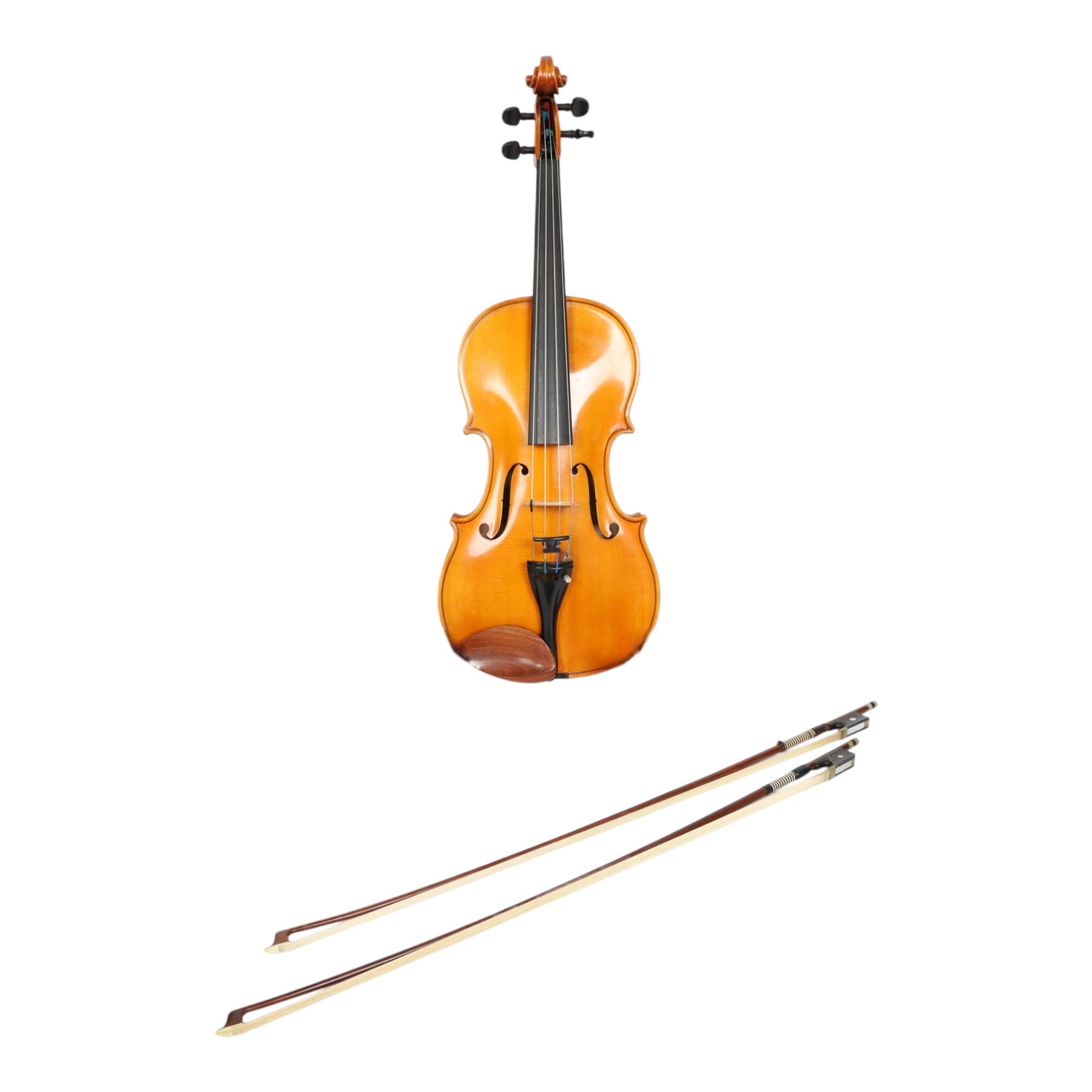 Late 20th century German full size viola, labelled to interior 'Walter Muller Bad Brambach 1976 made in GDR' with two-piece back, ebonised finger board, tuning pegs and tail piece, with a carved scroll and two bows, in hard fitted case, back length 16 inches