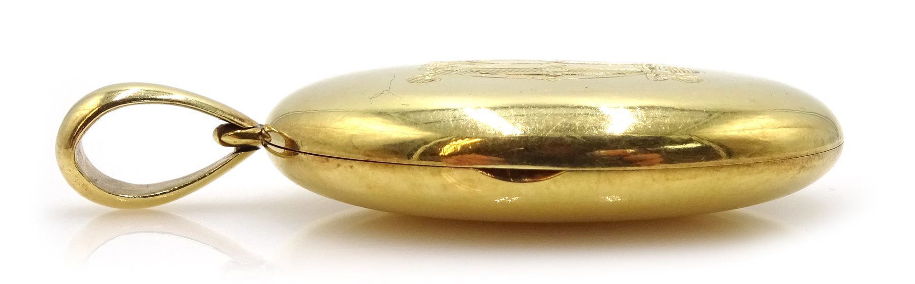  18ct gold oval hinged locket pendant, engraved initials on both sides, stamped 18 makers marks AD  