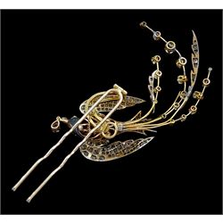 Victorian diamond swallow aigrette brooch, the gold backed silver swallow in flight set with old cut and rose cut diamonds, with cabochon ruby eyes, holding a pear cut diamond of approx 0.25 carat, to an old cut diamond spray tail of approx 1.95 carat, total diamond weight approx 4.00 carat