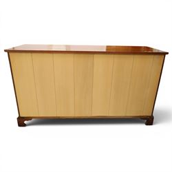 Acornman - mahogany sideboard, rectangular top over four drawers and four panelled cupboard doors with brass handles, on bracket feet, with signature carved acorn, by the workshop of Alan Grainger of Brandsby