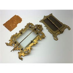 A pair of 19th century gilt metal rococo style frames, H29cm, together with two smaller later examples, H23cm. (4). 