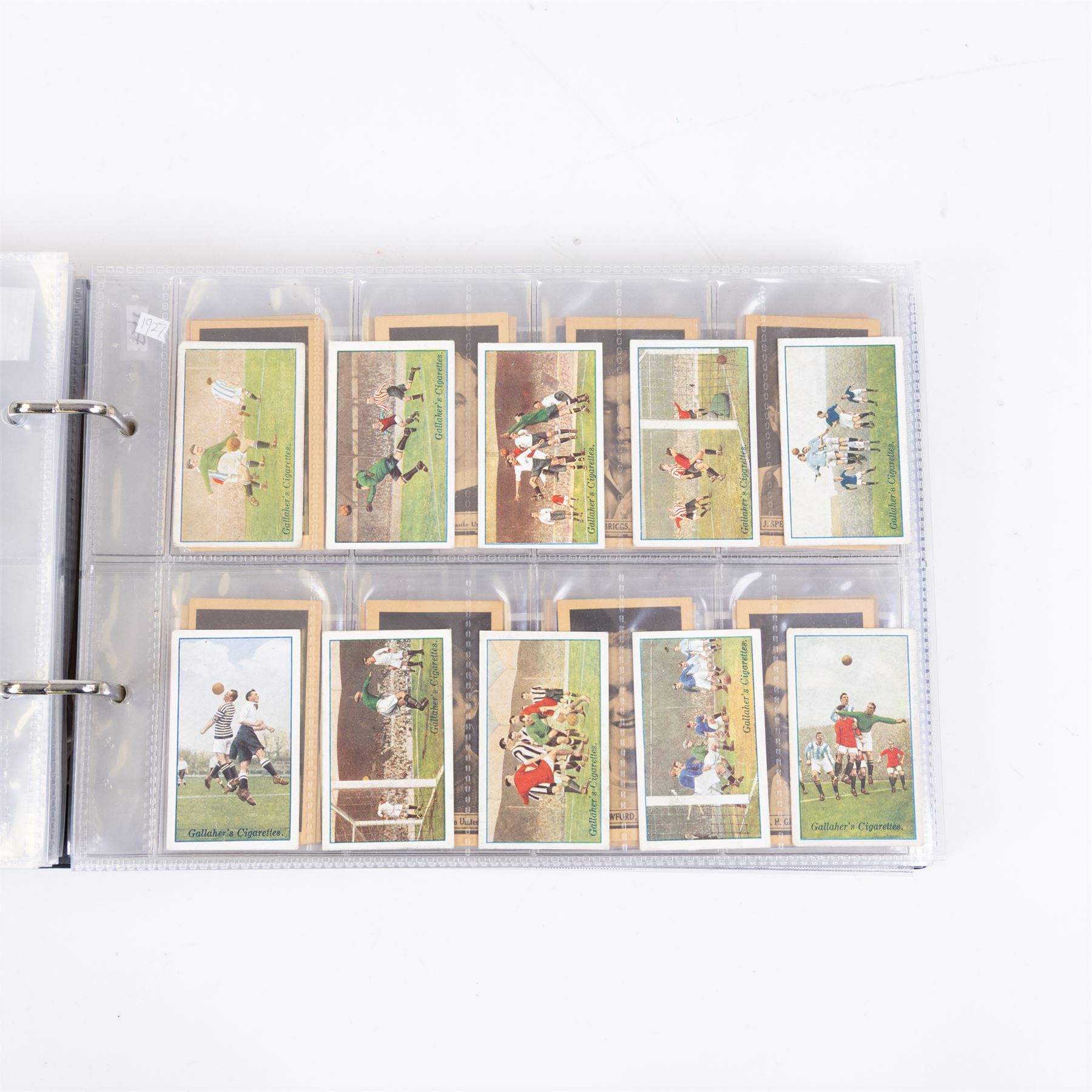 Collection of Edwardian and later Football related trading and cigarette cards, including forty-nine of fifty 1906 Ogden's Football Club Colours, 1922 PALS Footall series, ninety of one hundred 1925 Gallaher Famous Footballers, complete set of forty-four 1926 Ogden's Captains of Association Football Clubs and Colours, complete set of fifty 1927 Players Football Caricatures by MAC,  complete set of fifty 1927 Players Football Caricatures by RIP,  complete set of fifty 1930 Players Association Cup Winners, complete set of 50 1933 Ogdens AFC Nicknames etc, housed in brown cigarette card album