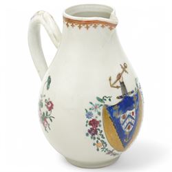 Chinese export Armorial part service decorated with sprays of flowers and a crest of an arm holding an anchor comprising bowl D23cm, pair of octagonal plates 16cm and sparrow beak jug H12cm (4)