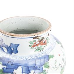 17th century Transitional period Chinese Wucai vase and cover, of baluster form, the body painted with ladies upon a terrace, and figures upon horseback and attendants within a fenced garden, the domed cover with knop finial painted with boys at play, H37cm
