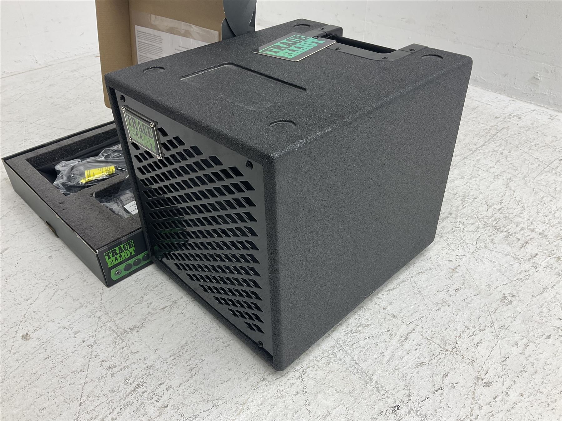Trace Elliot ELF Ultra Compact Bass Amplifier; 200 watts; still in factory packaging and delivery box with paperwork; and Trace Elliot 10