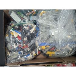 Large collection of loose Lego, including minifigures, together with three Lego ideas books, in five boxes