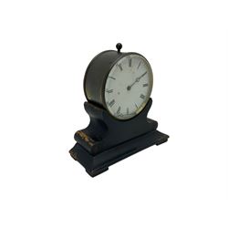 Late 19th century French Drum clock with an 8-day “tick-tack” movement, circular brass case and ebonised wooden stand, white card dial with roman numerals and steel moon hands, Parisian movement stamped VAP (Victor Athanase Pierret) with a deadbeat escapement, integral pendulum and key, wound and set from the rear.