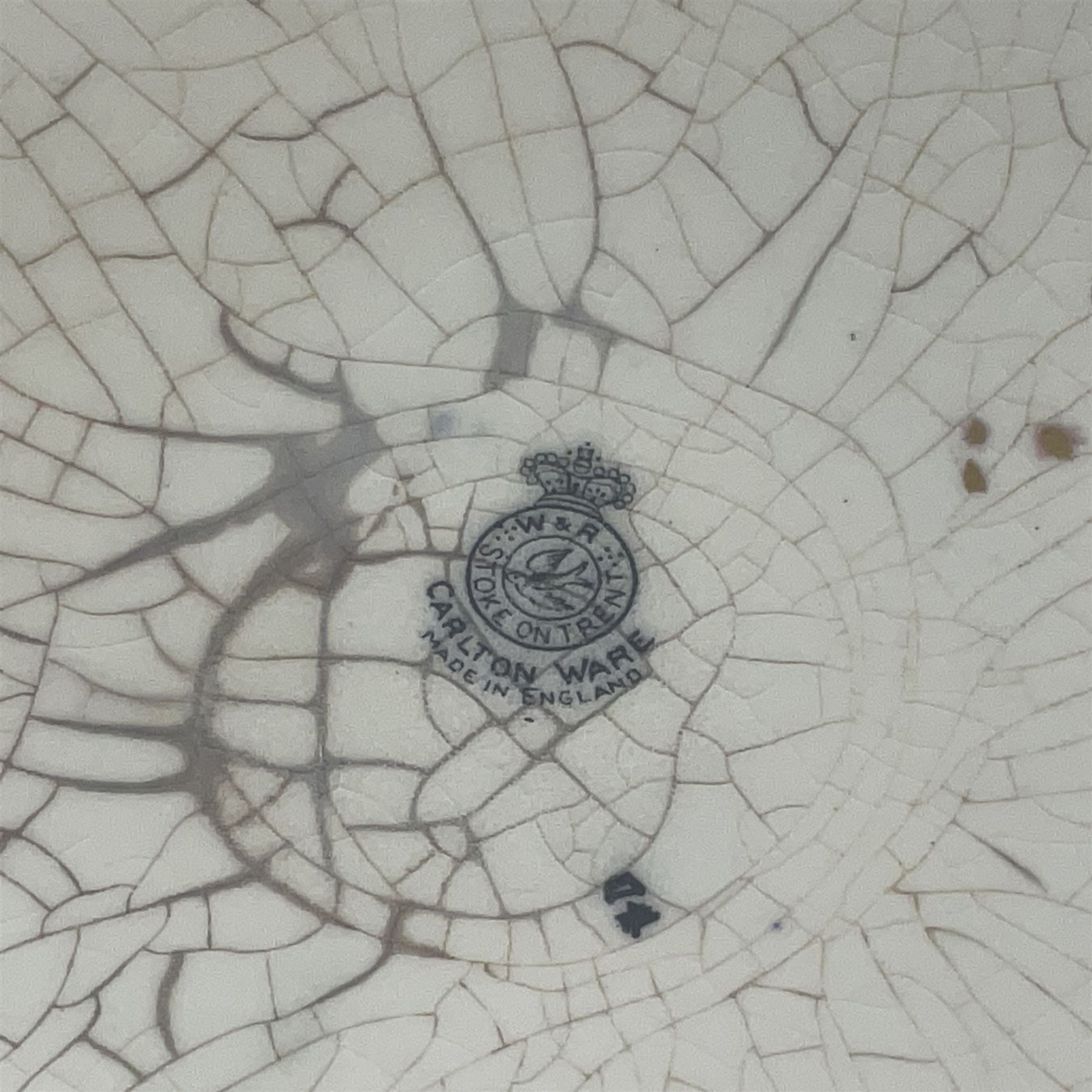 Carlton Ware lustre ginger jar and cover decorated with birds in flight on a blue ground, H32cm