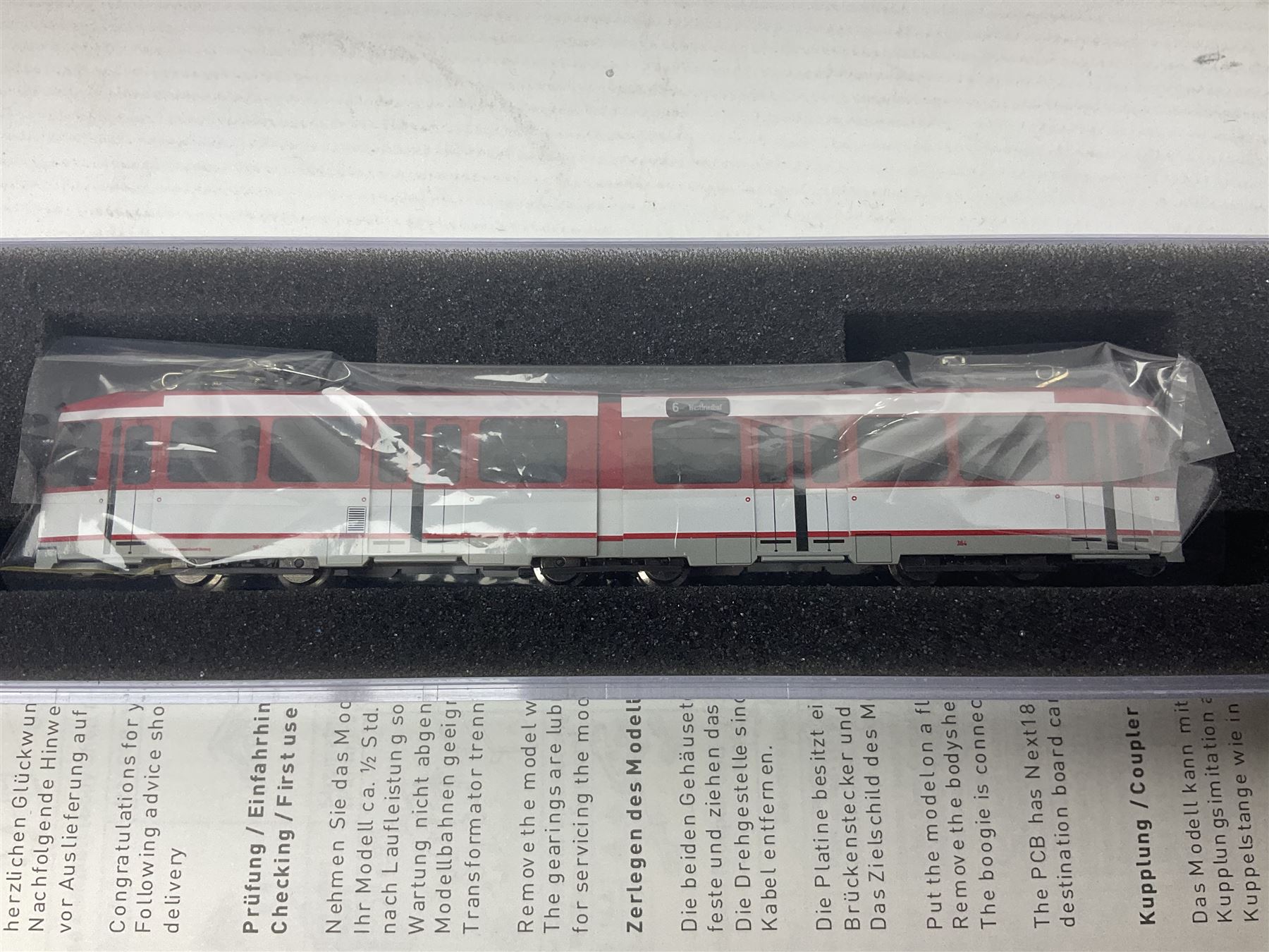 Hobbytrain 'N' gauge - three locomotives - H2970 Vectron Ep.VI CargoServ; H14902 Strassenbahn Duwag M6 Muhlheim/Ruhr; and H14903 Strassenbahn Duwag M6 Nurnberg; all boxed (3)