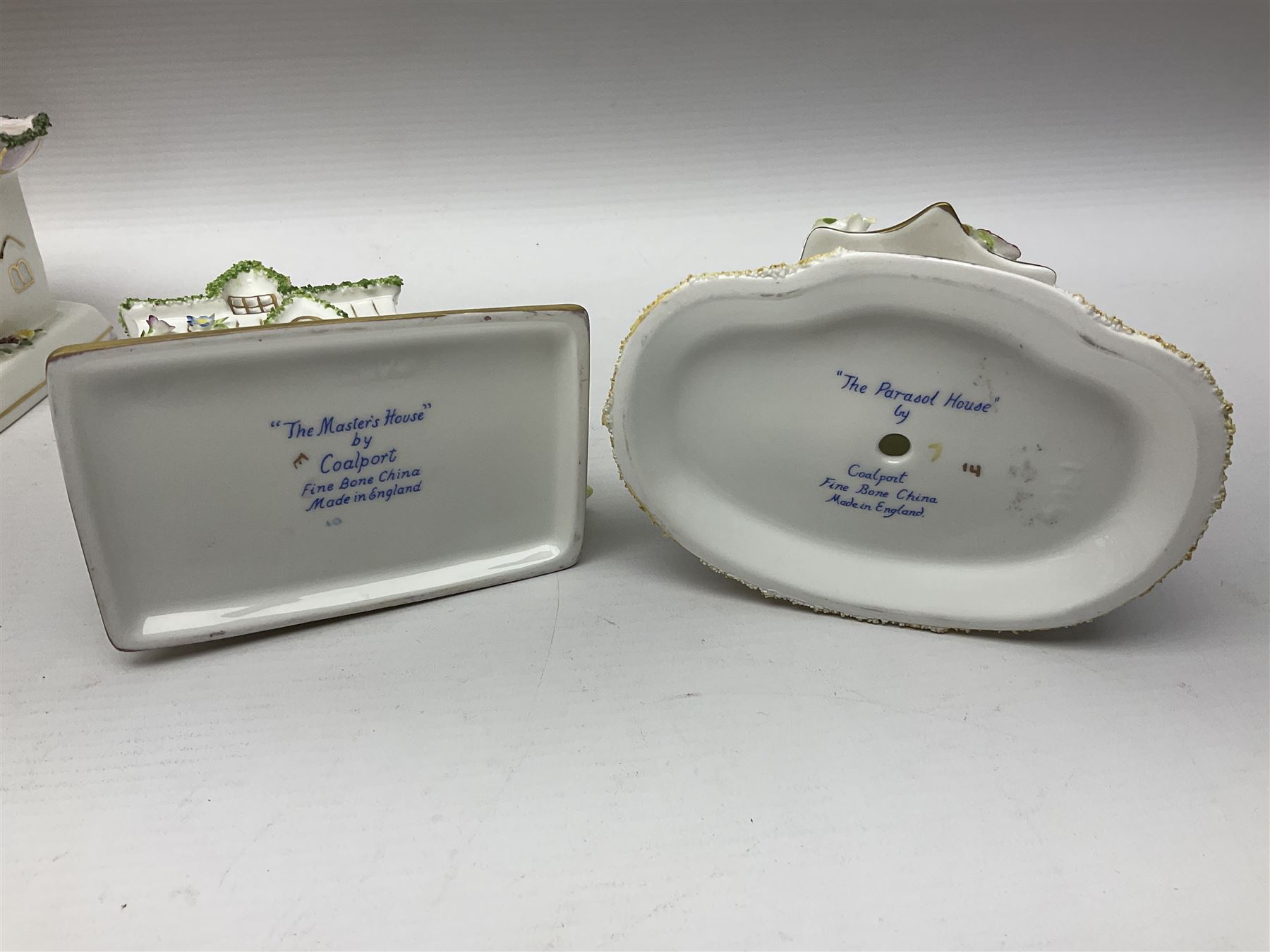 Eleven Coalport cottages, including Park Folly, The Alms House, Watermill and The Summer House, each with printed marks beneath