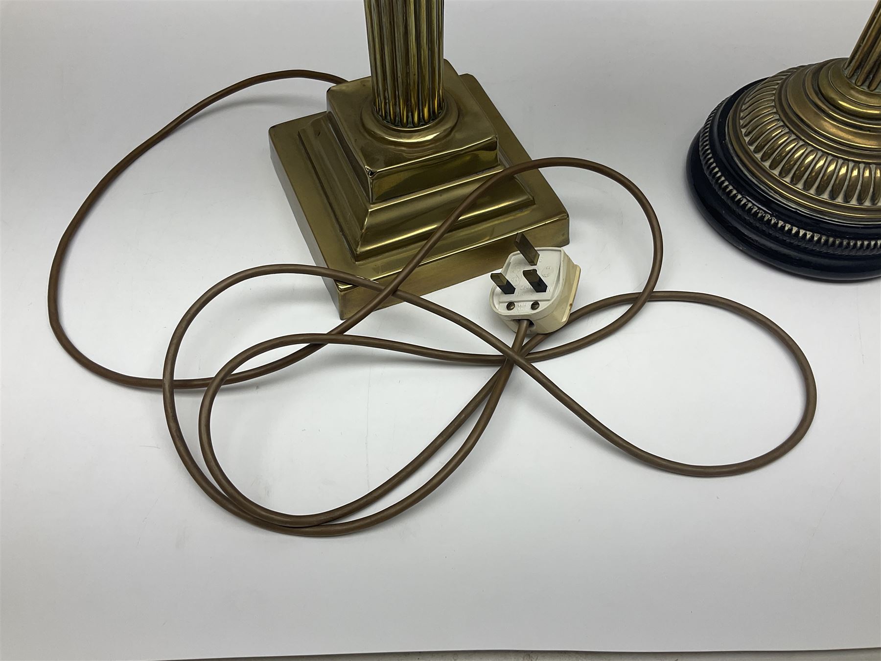Brass table lamp in the form of a Corinthian column, together with a converted oil lamp, tallest without lightbulb H50cm