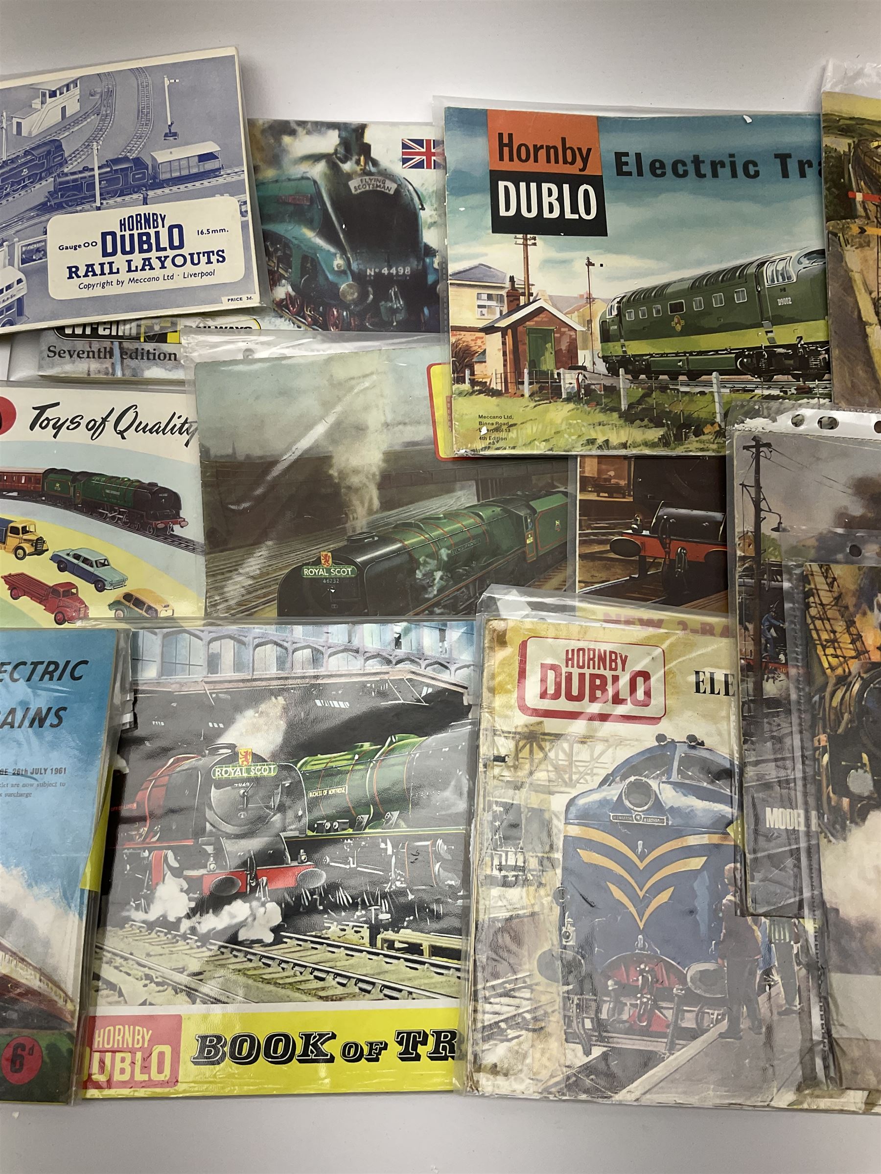 Hornby Dublo - three Electric Trains Catalogues 2nd - 4th editions 1960-62; Book of Trains 1959; New 2-Rail Leaflet 1960; Meccano Catalogue 1958; Rail Layouts booklet; three Tri-ang/Tri-ang Hornby catalogues 8th, 9th and 16th editions; Trix Twin Railway Permanent Way Manual 1953; and Wrenn catalogue 7th edition c1988.