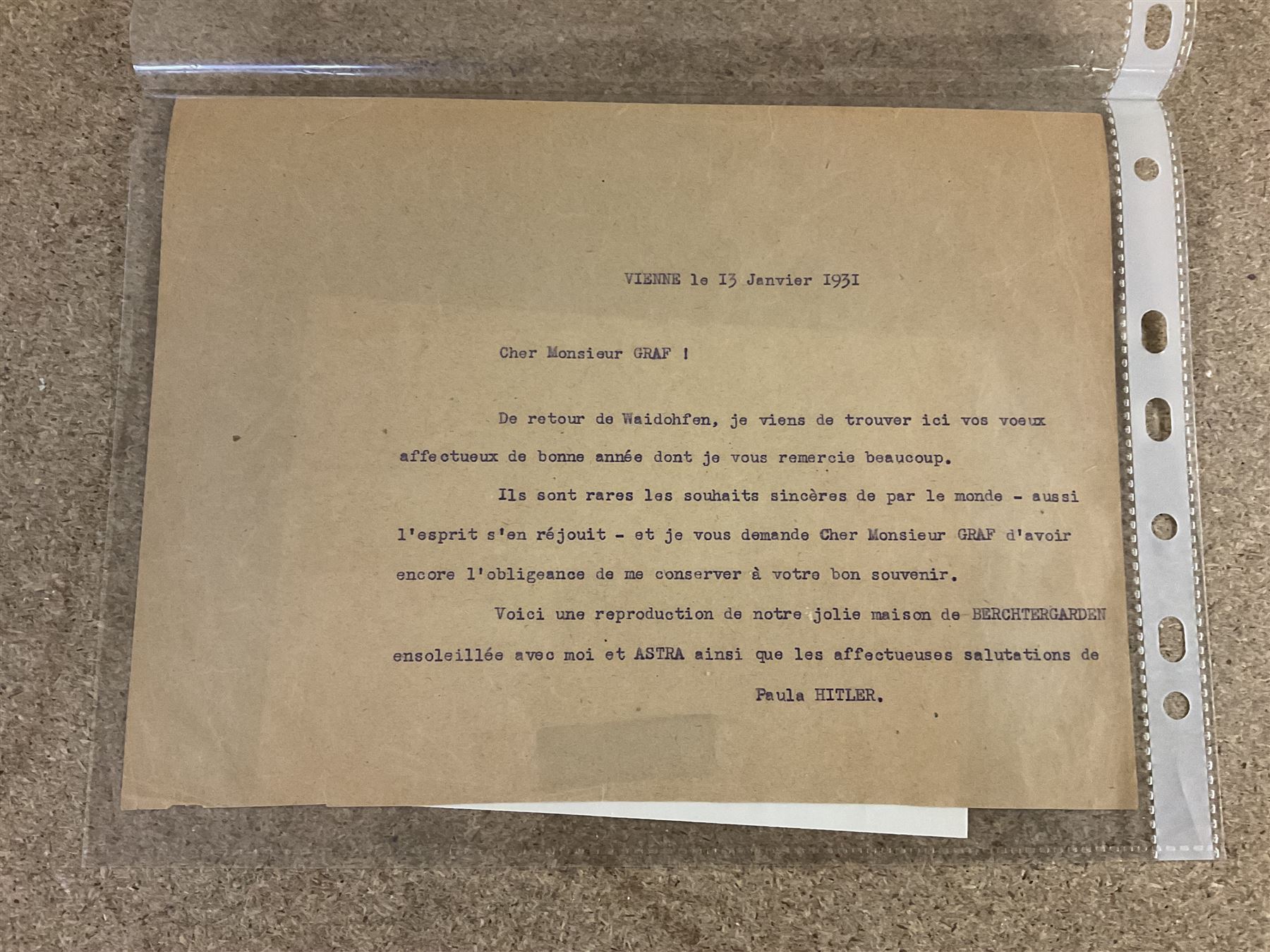 Photograph of Adolf Hitler, together with photograph of Hitler's neice Geli Raubal, an original types letter from Hitler's sister Laula Hitler and a spare savings book belonging to Hitler 