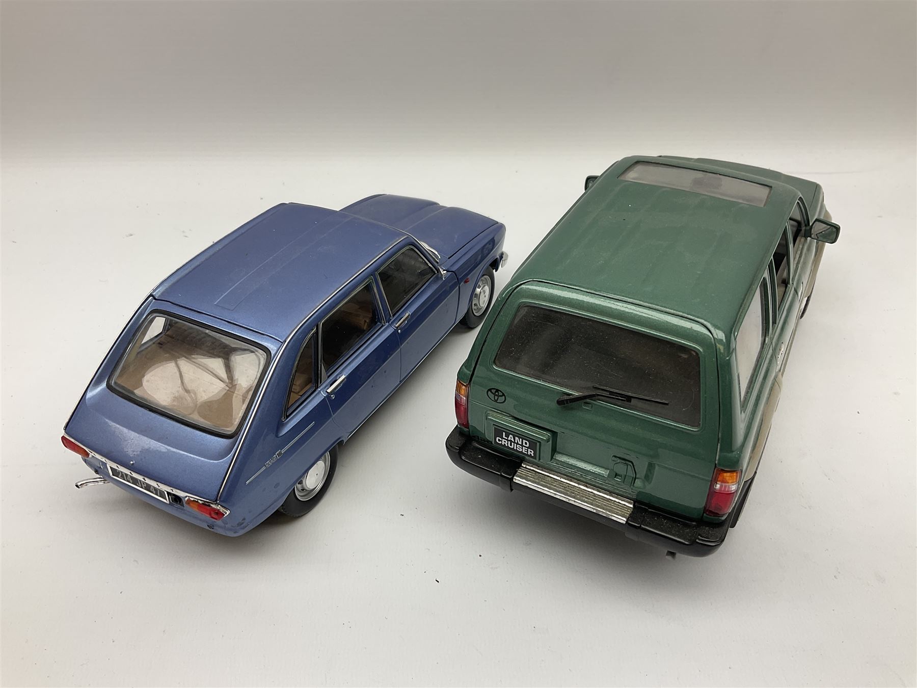 Nine 1:18 scale die-cast models including Ertl Chevrolet; Norev Renault 16; Sun Star Mitsubishi Pajero and Lotus Elan; Motor Max Land Rover Discovery; Road Tough Mercedes Benz 500SL etc; all unboxed (9)