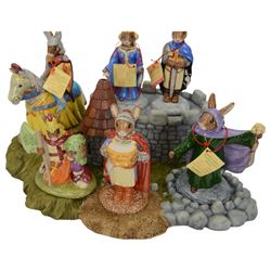 Royal Doulton Bunnykins, comprising of three complete sets;  The Arthurian Legend Set, with display plinth, Sir Gawain, Queen Guinevere, Sir Galahad, Merlin, King Arthur, Sir Galahad; Tudor set with display plinth, Henry VIII, Anne Boleyn, Jane Seymour, Catherine of Aragon, Catherine Parr, Anne Of Cleaves and Catherine Howard; The Occasions Collection: with display plinth, Christmas Morning, Wedding Day, Love Heart, Easter Treat, Birthday Girl, Congratulations, Graduation Day and Easter Parade, all with original boxes