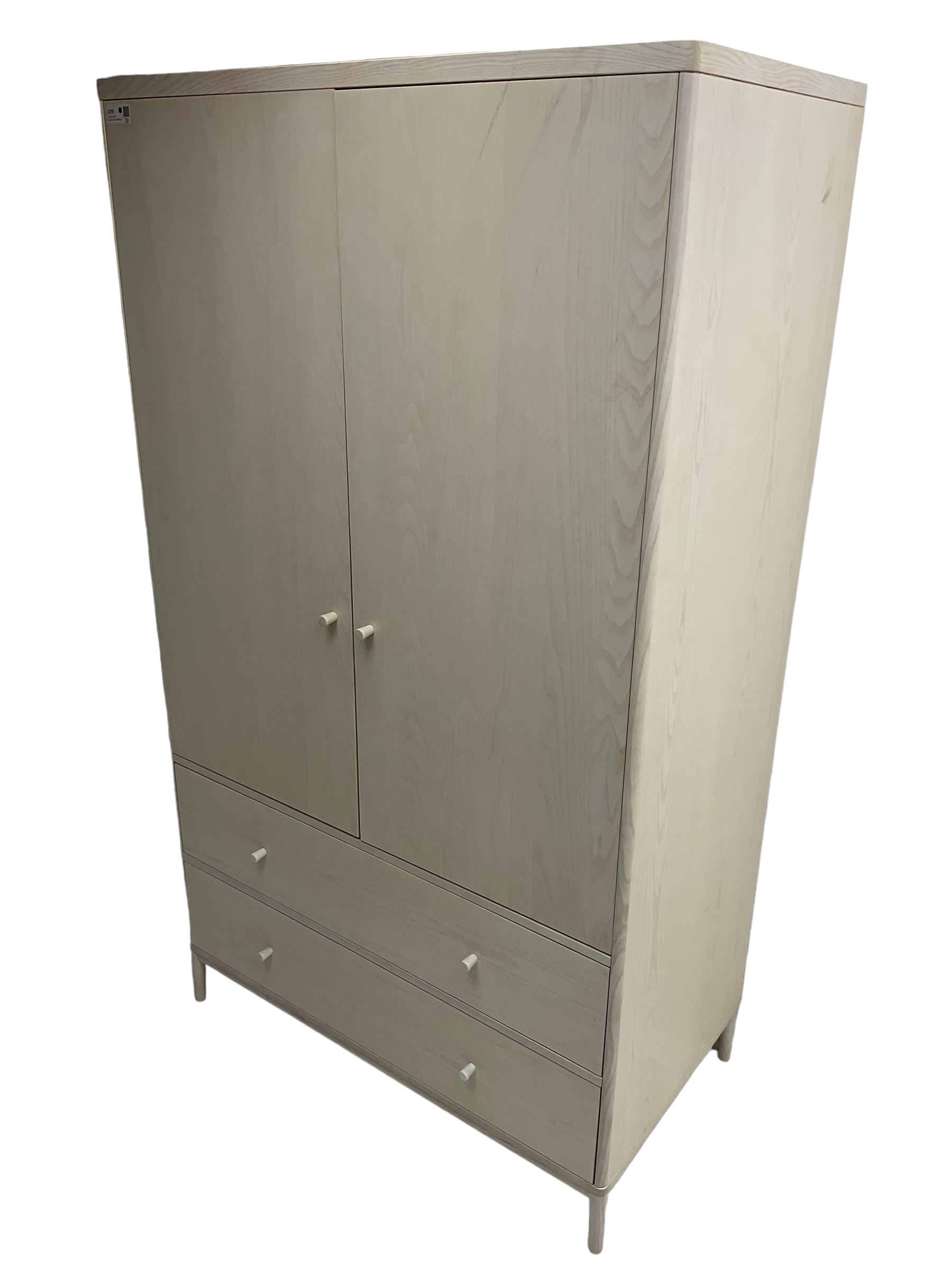 Ercol - 'Salina' wardrobe enclosed by two doors, fitted with two long drawers