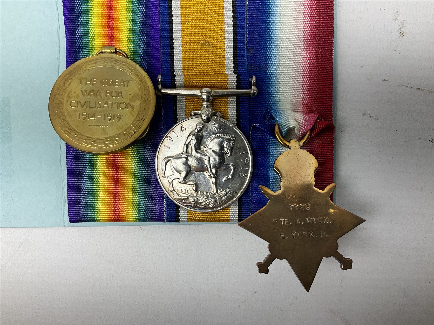 WW1 father and son medal groups comprising British War Medal and Mercantile Marine Medal awarded to Captain Allanson Hick and British War medal, 1914-15 Star and Victory Medal awarded to 1198 Pte. Allanson Hick E. York. R. with biographical information. N.B. Allanson Hick Jnr. of Hull was a celebrated architect and renowned marine artist being a founder member of the Society of Marine Artists (RSMA).