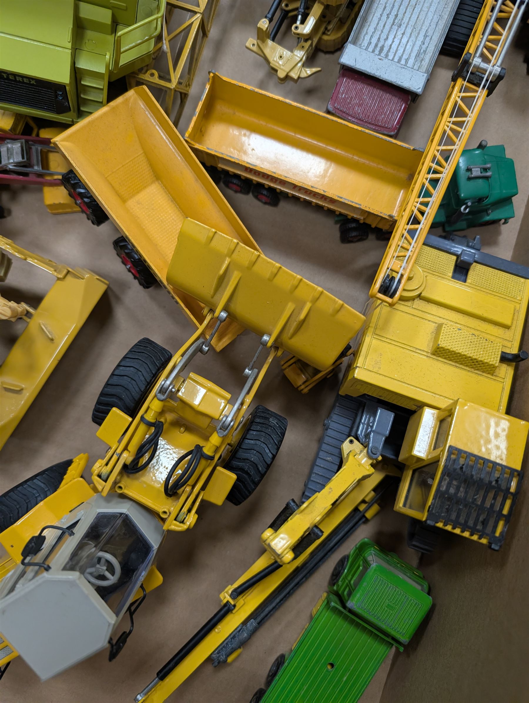 Collection of diecast construction vehicles, including West German NZG Modelle Terex no. 407 and other examples by Joal, Ros, ERTL, etc, all unboxed 