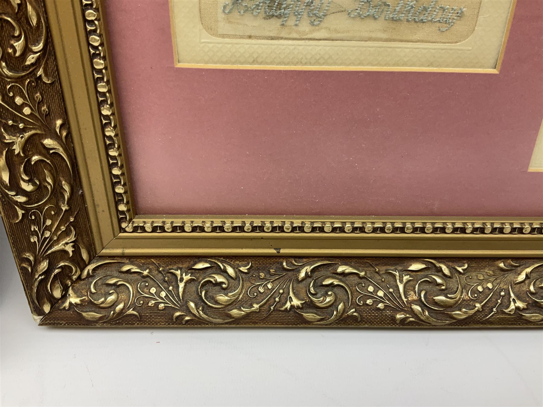 Thirty-five WW1 embroidered silk postcards including regimental crests, flags of the Allies, envelope type with greeting card inserts, Christmas and birthday cards etc; mounted and glazed in three graduated modern matching gilt frames (3)