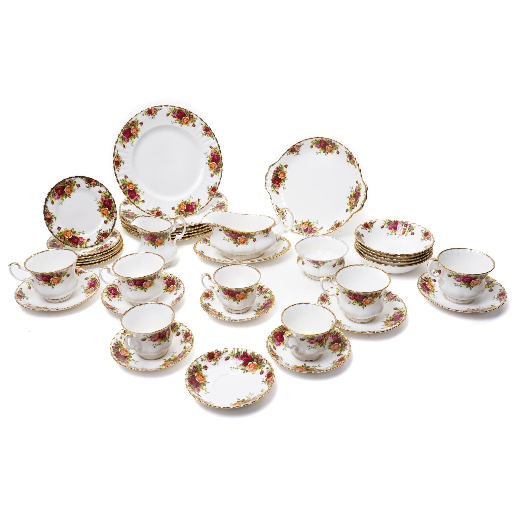 Royal Albert Old Country Roses tea and dinner ware comprising six dinner plates, five dessert bowls, sauce boat and stand, four breakfast cups and saucers, three tea cups and four saucers, six tea plates, milk jug, sugar bowl and bread and butter plate