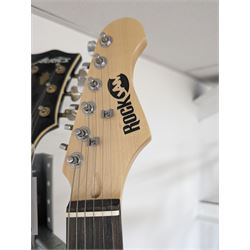 Rock Jam six string electric guitar, together with a Rock Jam amplifier and an Atrics guitar
