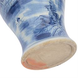 20th century Chinese blue and white jar and cover, of baluster form with domed cover with foo dog finial, decorated with waterside landscape scene with huts upon islands and figures in boats, H45.5cm