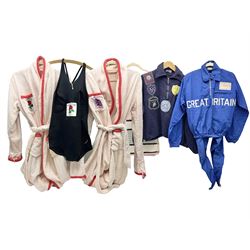 On the direct instructions of Anita Porter nee Lonsbrough Great British Olympic and Commonwealth Games gold medal winning swimmer - collection of early and international memorabilia comprising original Huddersfield Bath Club track suit top bearing eight stitched on cloth badges including British Empire & Commonwealth Games 1958 England Team, YSASA, North Eastern Counties ASA, ESSA Division 3,  English Schools Swimming Association winner etc
The swimming costume Anita wore at the 1958 Commonwealth Games in Cardiff, her first major championships, where she won two gold medals. The grey elastic on the sides, in those days, she would use to make it tighter and more streamlined.
Blue track suit from the 1960 Olympics which she wore on the podium receiving the gold medal.
1960 pool side towelling robe used at the Rome Olympics (interesting to note her name is spelt wrong on the embroidered label).
1962 Commonwealth Games pool side towelling robe used in Perth Australia when winning three Gold medals. 
It was also this year she became BBC Sports Personality of the year, the first female to do so.
Her 'lucky' pool side towel which she took with her to every event she competed in and which can be seen round her neck in many official celebratory photographs. Copies of some of these photographs are included for identification.
In addition there are two souvenir programmes of an evening event to honour Anita at The Theatre Royal Huddersfield and she has kindly signed the front cover on one of these.