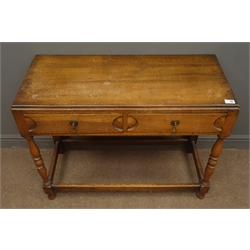  1930's oak side table, two drawers, turned supports joined by stretchers, W91cm, H71cm, D40cm  