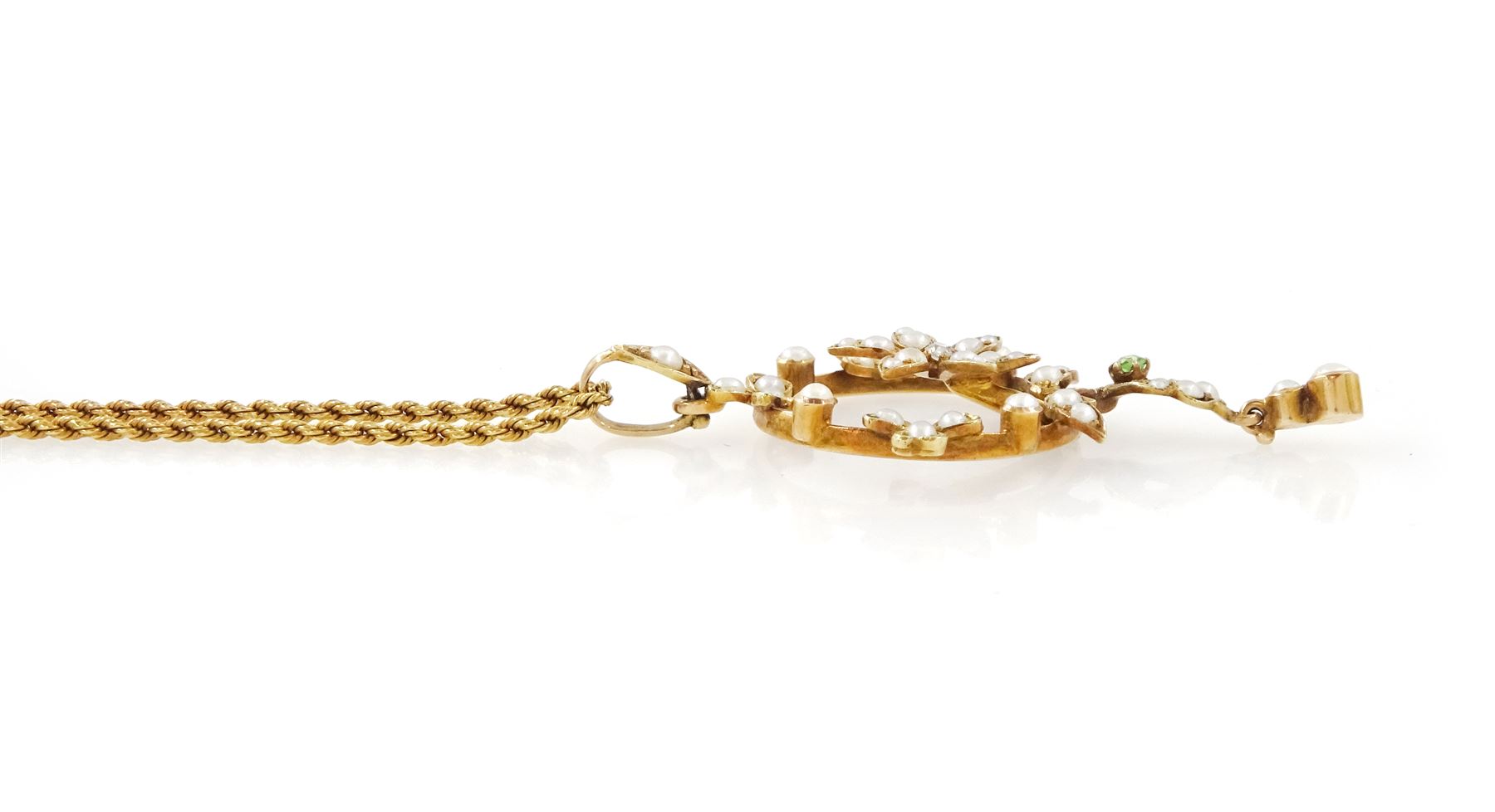 Early 20th century 15ct gold pearl, diamond and garnet pendant necklace, the flower wreath pendant, set with split pearls, a single old cut diamond  and green garnet, on a rope twist necklace, both stamped 15c