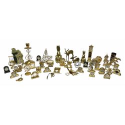 Collection of brass miniature clocks to include examples modelled as mantel clocks, grandfather clocks, robots, sunflowers, teddy bears etc, other similar miniature clocks and assorted brass and metal ware figures