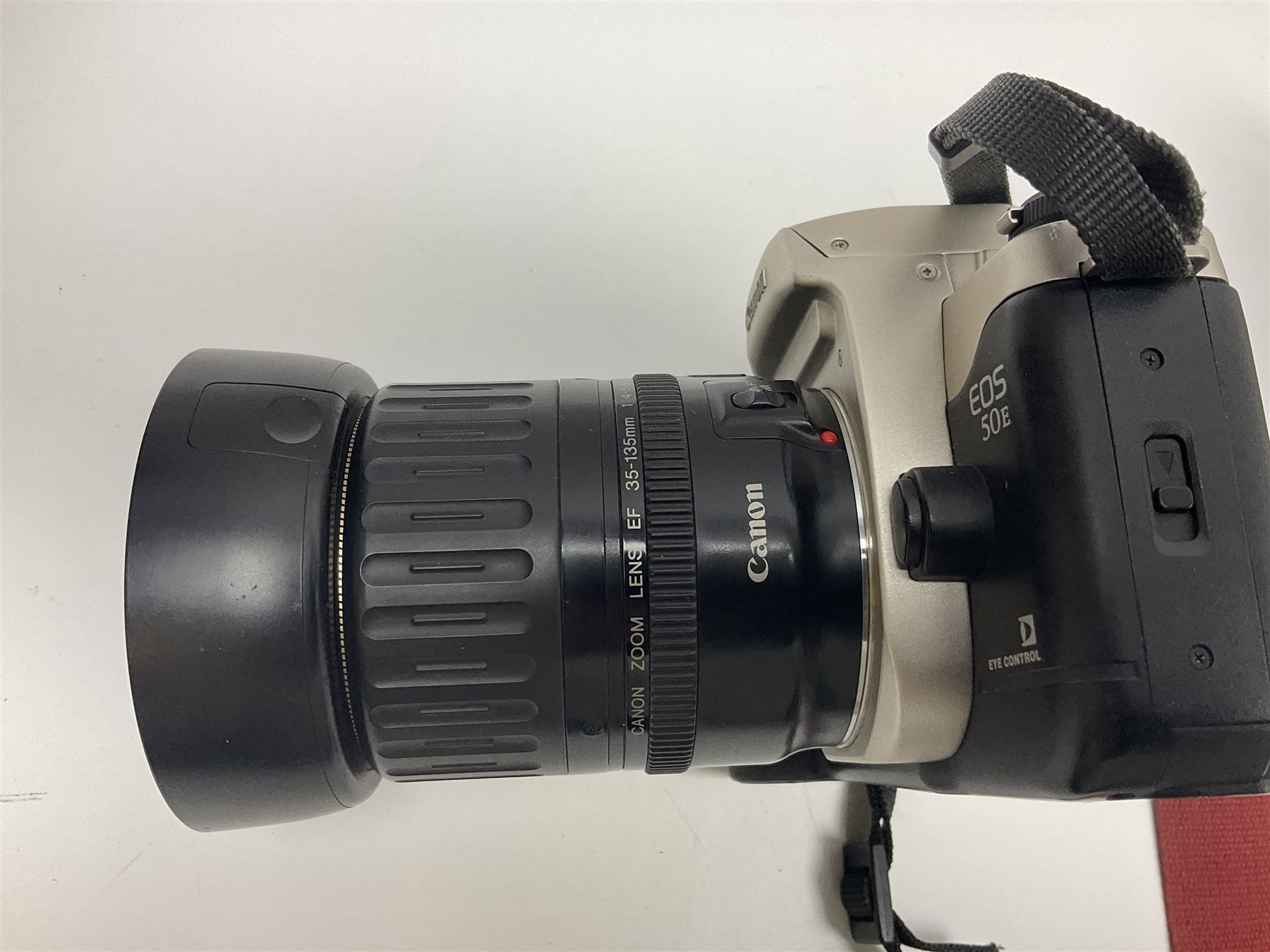 Canon EOS 50e camera body, serial no 8305671 with 'Canon Zoom EF 35-135mm 1:4-5.6' lens together with Halina 35X super camera body, with 'Halina Anastigmat f.c. 1:3.5 f=45mm' lens and other camera equipment 