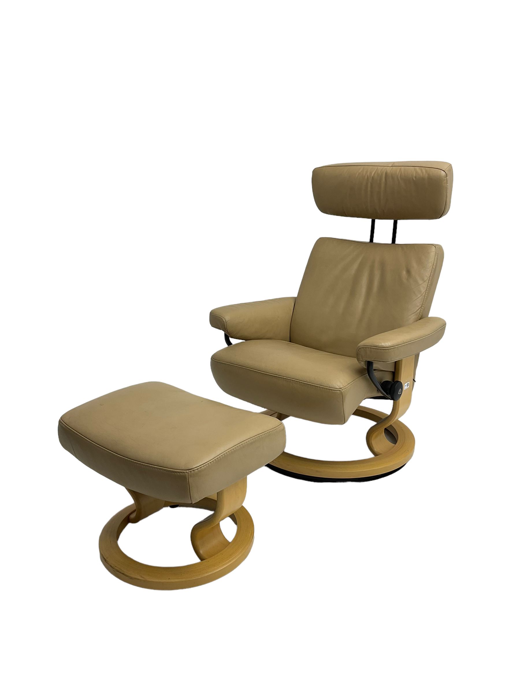 Ekornes Stressless - reclining armchair upholstered in latte leather, with footstool