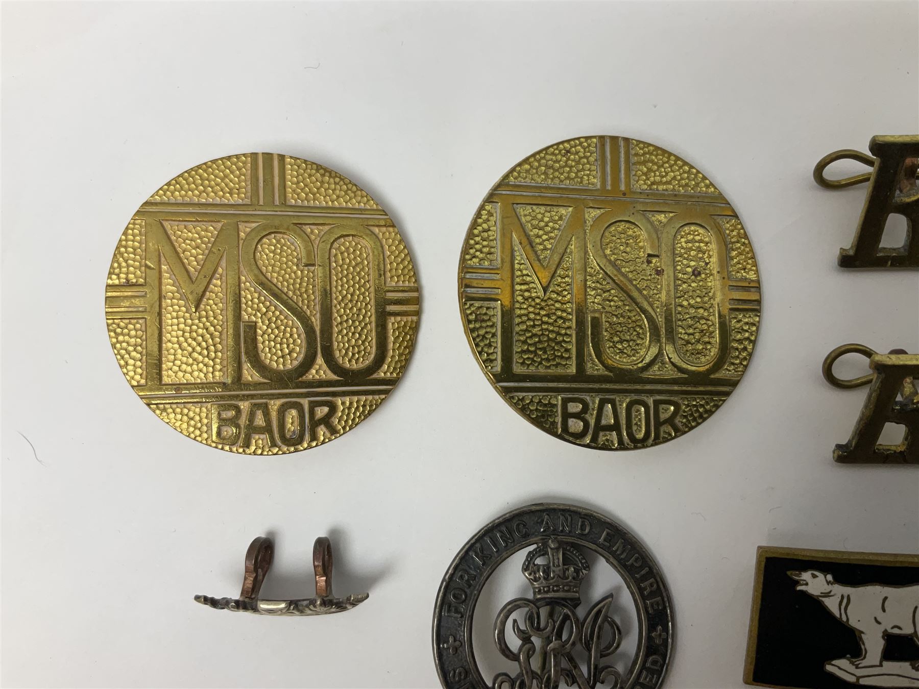 Two Services Rendered badges Nos.B23060 and B201341; two MSO BAOR (Mixed Services Organisation British Army of the Rhine) badges; small quantity of shoulder titles, lapel/sweetheart brooches, buttons and non-military related items