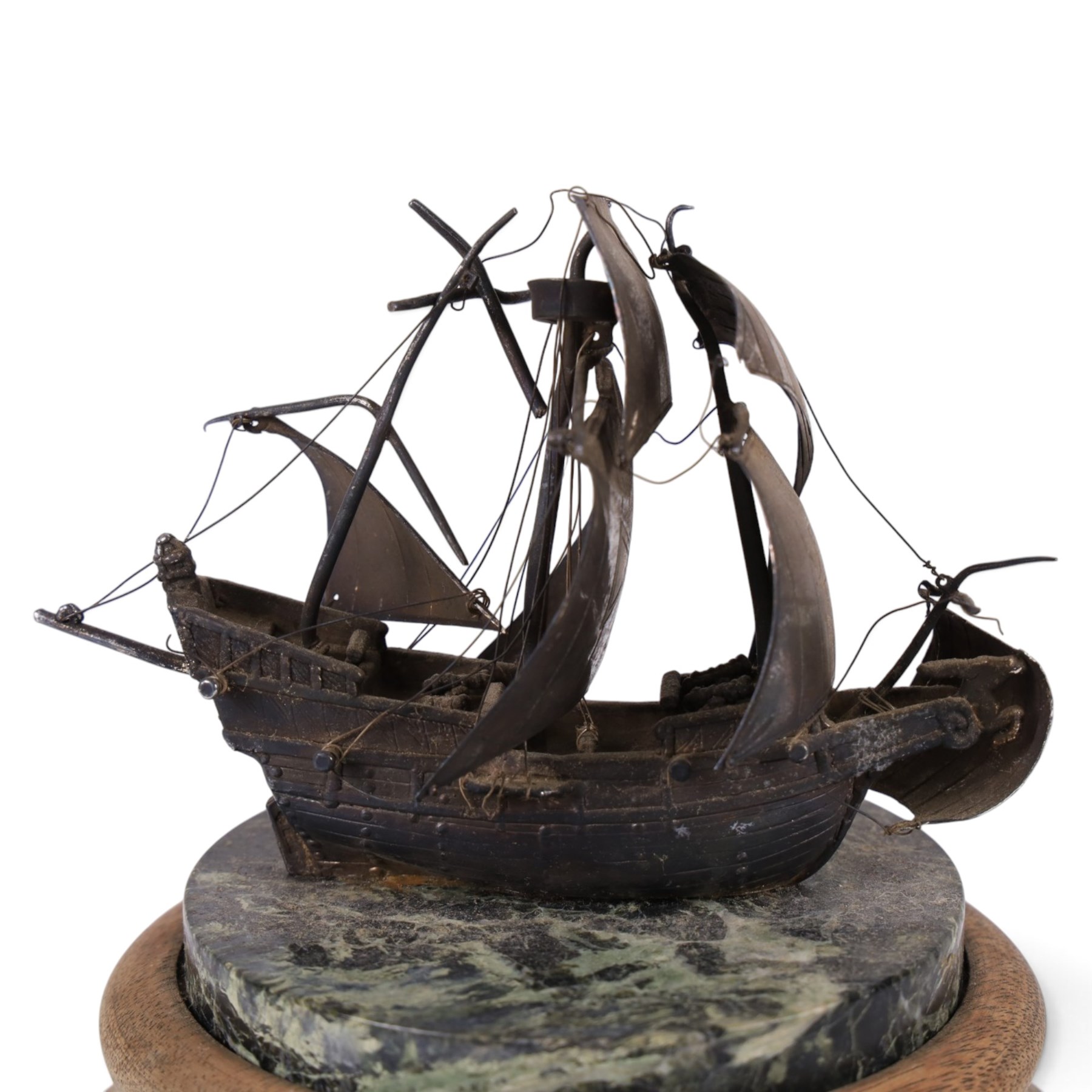 Limited edition Charles Frodsham of London for The St. James's House Company 'Mariners World Clock', the cylindrical brass and wooden body with two silvered annular chapter rings displaying the time and world location, surmounted by silver model of the Golden Hinde upon marble plinth, no. 240/500, H24cm 