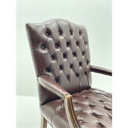 Georgian style mahogany framed armchair upholstered in brown leather