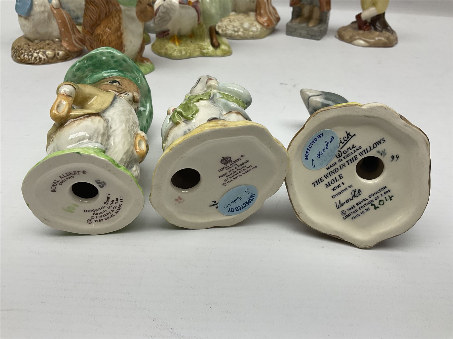 Sixteen Royal Albert Beatrix Potter figures, including Poorly Peter Rabbit, Jemima Puddle Duck and Squirrel Nutkin etc, all boxed together with a Beswick Beatrix Potter Jeremy Fisher miniature jug and four Beswick Wind in the Willows figures 