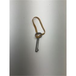 Early 20th century silver plated tantalus by John Grinsell & Sons of Birmingham, containing two crystal glass decanters, with key, H31cm