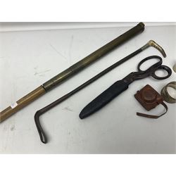 walking stick with in-built brass telescope, silver napkin ring , Mycro camera, riding crop, and scissors