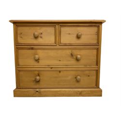 Solid pine chest, fitted with two short and two long drawers with moulded reeded facias, on plinth base