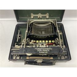 Corona typewriter in case, together with a grey angle pose style lamp