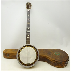  19th/ early 20th century five string banjo, with mother-of-pearl inlaid fret board and birds eye maple body, carved heel and plated bright cut resonator, stamped to the back of the peghead 'Franco Piper no. 5878' with retailers label to the front, in fitted leather case - Provenance Franco Piper was a South African Banjo Juggling performer between 1899 - 1917  