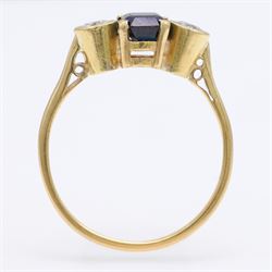 18ct gold sapphire and diamond three stone ring, single octagonal cut sapphire, with a single round brilliant cut diamond set either side, total diamond weight approx 0.25 carat