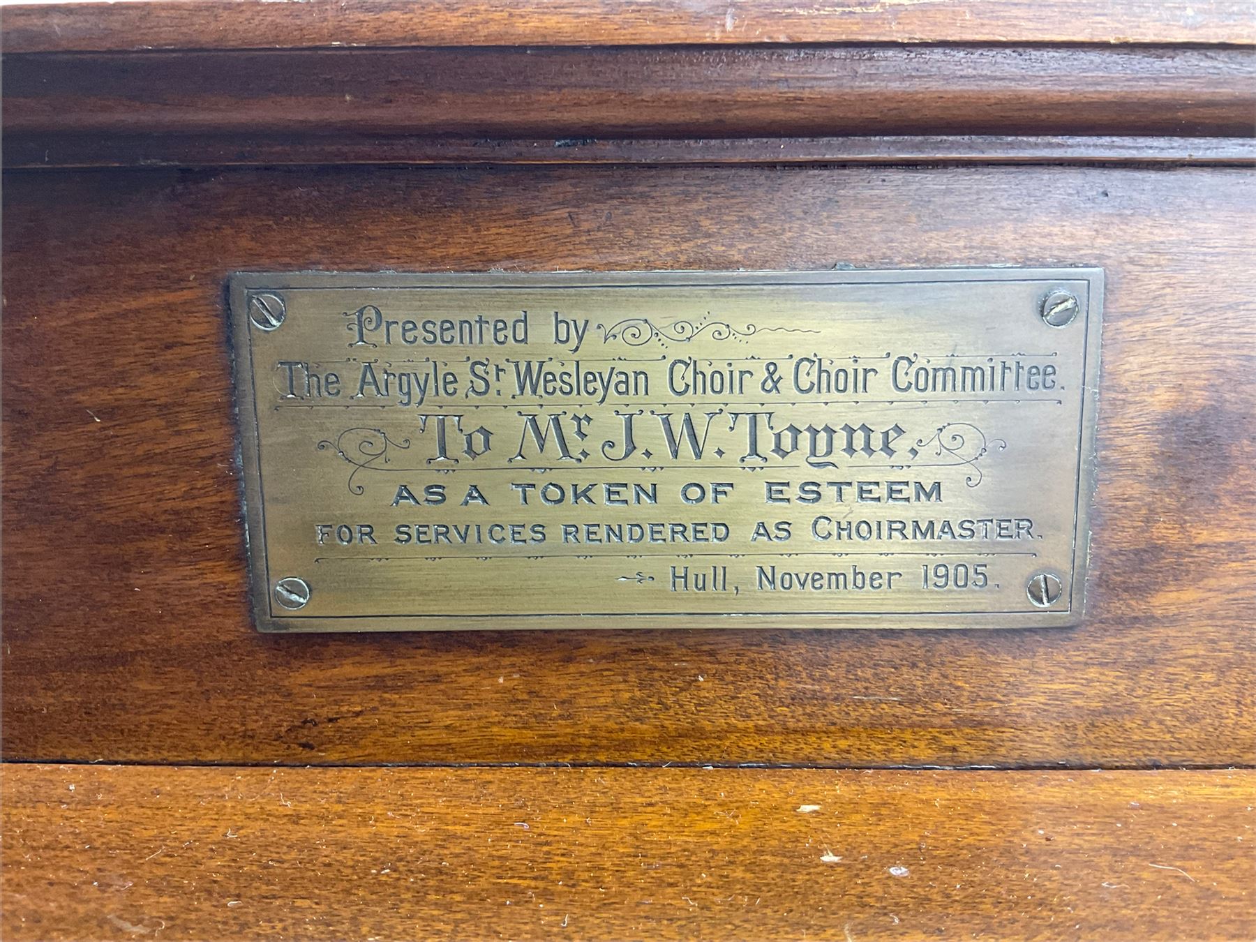 Edwardian walnut sheet music cabinet, raised back with plaque inscribed 