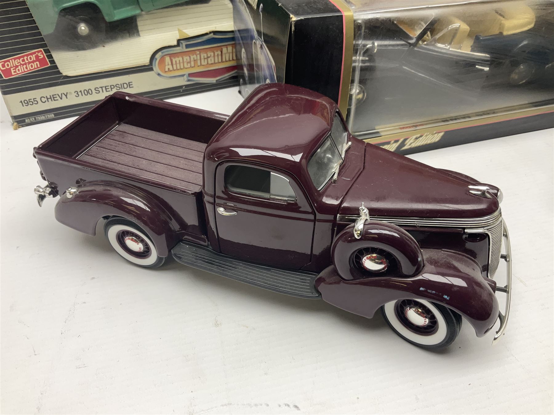 Seven 1:18 scale die-cast models by Ertl, Road legends, Maisto, Solido etc including two Coca Cola promotional vehicles; five boxed (7)