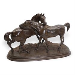 After Pierre-Jules Mene (1810-1879) - 'L'Accolade' (The Embrace) a bronze group of two horses with their necks crossed standing on a shaped oval base signed 'P J Mene' H36cm x W51cm