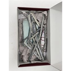 Collection of stained and leaded glass windows and panes, stylised floral design, various sizes, the largest window measuring 55cm x 112cm (including wooden frame)