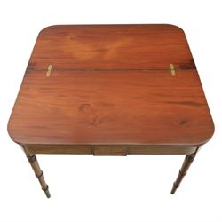Mid-19th century mahogany console table, featuring extending fold-over top with double rear gate-leg action, raised on turned legs